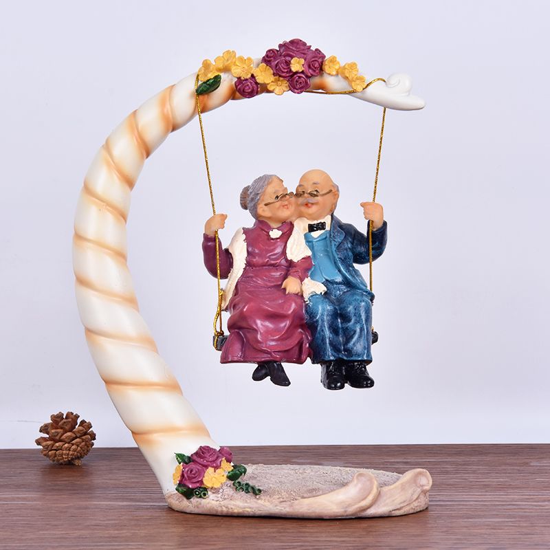 تماثيل راتين مسننين على أرجوحة - مراجعة Resin Art For Wedding Gift وسعره